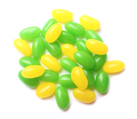 Pile of tasty bright jelly beans isolated on white, top view