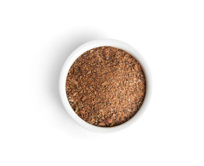 Bowl of ground pepper isolated on white, top view
