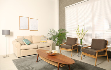 Living room interior with stylish furniture