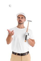 Portrait of young man with golf club and ball on white background