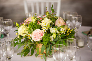 Event decoration with flowers at indoor ceremony