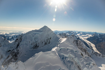 Fototapeta na wymiar Aerial views above the Peaks of the highest Southern Alps