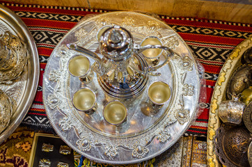 Omani Coffee (kahwa) cups and the jug on display in Muscat, Oman.