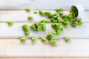 Bitter Beans on wood table