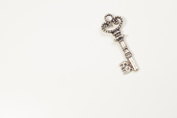 Vintage key isolated on white background. safety concept