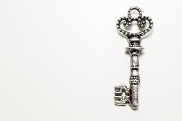 Vintage key isolated on white background. safety concept