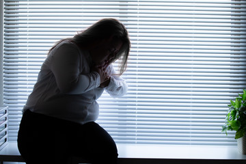 woman feel heart attack