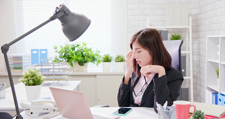 Asia woman worker feel tired