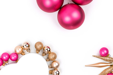 Heart shaped Christmas gift box with  pink and gold Christmas balls with  for holiday, christmas, thanks giving day, birthday top view isolated on white background. 