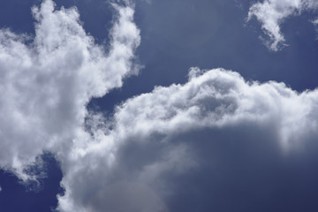 movement of white cloud over sky.