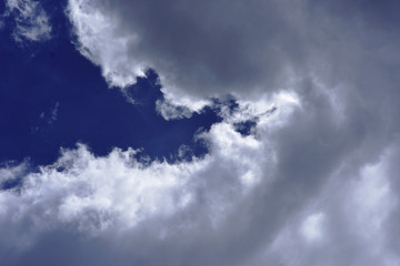movement of white cloud over sky.