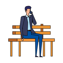 elegant businessman calling with smartphone seated in the park chair