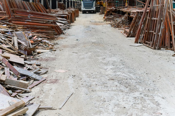 construction site with frames for scaffoldings aside