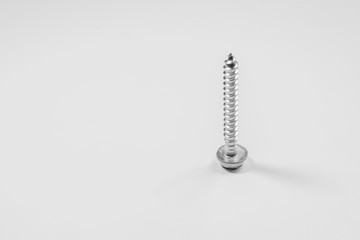 Screw on a white background