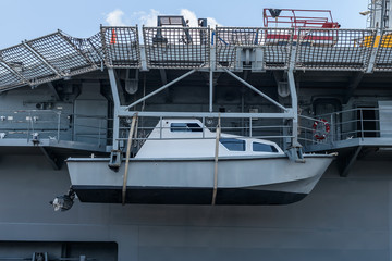 Naklejka premium Rescue ship or Lifeboat Hung on a battleship