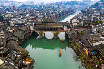 Obraz premium Aerial view of beautiful Fenghuang ancient town and Tuojiang river