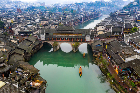 Aerial view of beautiful Fenghuang ancient town and Tuojiang river