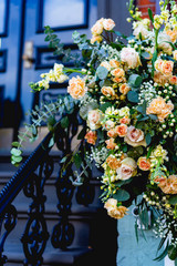 Muted roses on an old style staircase