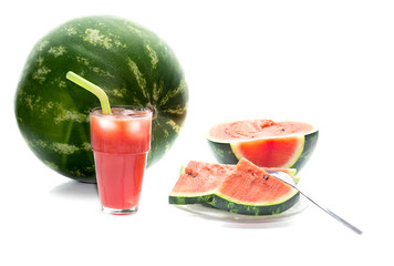 The watermelon cocktail with ice and watermelon slices close-up