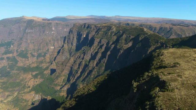 Aerial footage of Simien mountain and cliffs in Ethiopia at sunset
