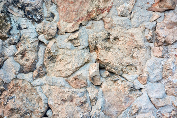 Texture stone yellow-colored clay, paving slabs yellow closeup.