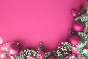 Christmas composition.  Background  pink colors with decorations.  Christmas, winter, new year concept. Flat lay, top view, copy space .