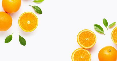 Fresh orange citrus fruit with leaves isolated on white background.