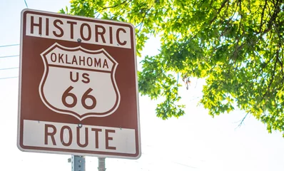 Poster Route 66 sign inTulsa Oklahoma USA. Sunny spring day © Rawf8