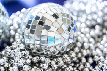 Sparkling disco ball in a day light. Concept of party.