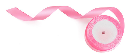 Curled pink ribbon isolated on white background