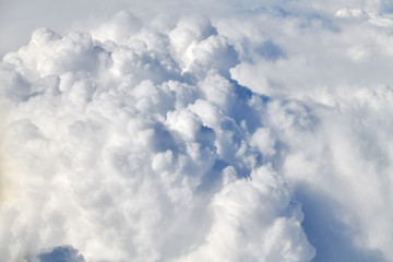 Naklejka na ściany i meble Take aerial photos of the sea of clouds on the plane.