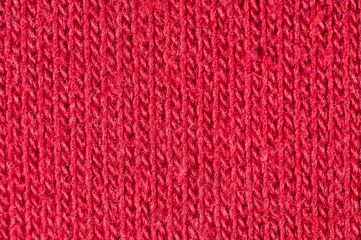 Red fabric of thin threads close up macro shot