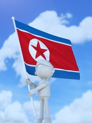 国旗を掲げる北朝鮮のスポーツ選手