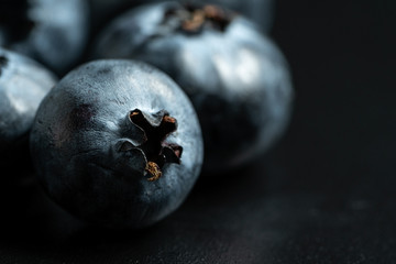 Macro view of blue ripe blueberries fruits