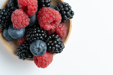 Macro view of mix with ripe blueberry, blackberry and raspberry fruits