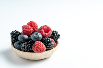 Macro view of mix with ripe blueberry, blackberry and raspberry fruits