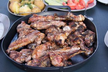 hot cooked barbeque meat on the plate
