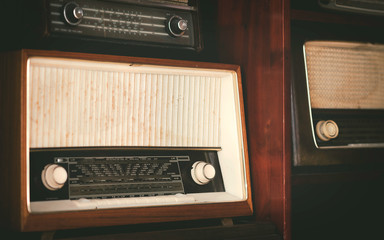 Vintage old-fashioned radio, old-fashioned radio placed in vintage style wooden cabinets, rare...