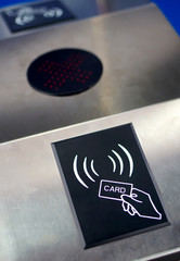 Closeup view of card operated turnstile in a public place        