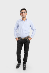Naklejka premium young indian man Standing over white background