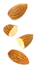 Almonds nuts kernels cores whole and broken in half soaring, falling, flying isolated on white background with clipping path. Set of parts. Full depth of field.