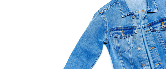 Close-up Blue denim jacket on isolated white background top view flat lay copy space. Denim,...