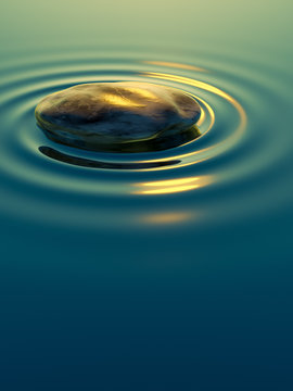 pebble stone in water with ripples background