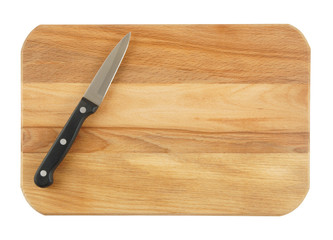Knife on cutting board isolated on white
