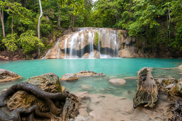 Fototapeta na wymiar Beautiful waterfall in Erawan waterfall National Park in Kanchanaburi, Thailand