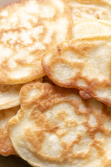 fresh pancakes on a glass dish. authentic homemade food. background backdrop.