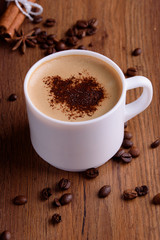 Creative layout made of coffee and cinnamon. Flat lay. Food concept. Macro concept.