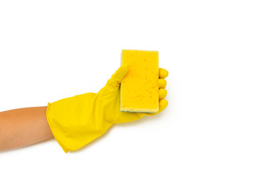 hand in yellow protective glove holding a bottle of sponge for cleaning