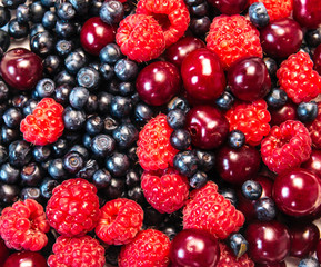  fresh raspberries, cherries and blueberries