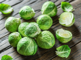 Brussel sprouts on the old wooden table.